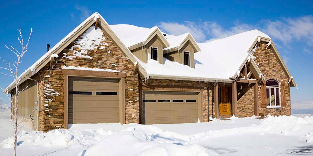 Tips to safely open a garage door stuck due to freezing conditions